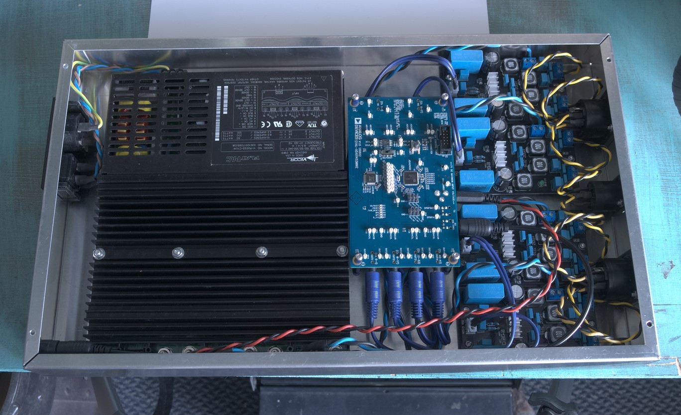 A view inside the amplifier enclosure, stuffed full of electronics.
