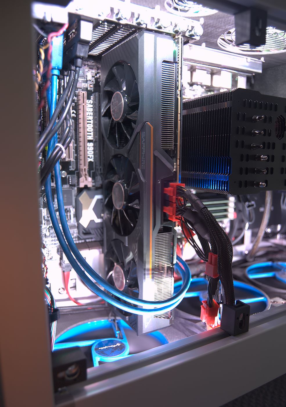 Close-up of the graphics card, which spans the full height of the case and has three fans.